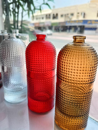 Perfume bottle in different colors